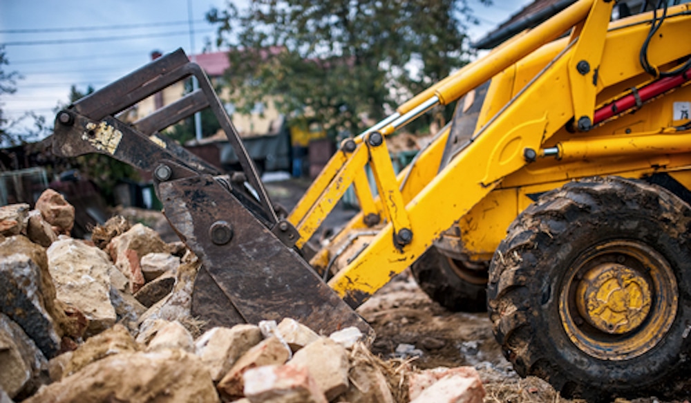 Bulldozer,Loading,Demolition,Debris,And,Concrete,Waste,For,Recycling,At